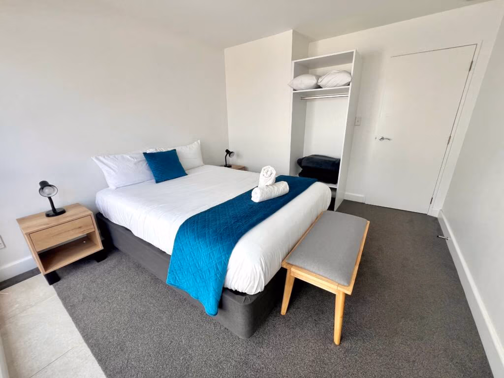 3 Bedroom Apartment bedroom with Queen bed